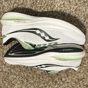 Saucony White and Green Running Sneakers. Brand new in box. Never worn
